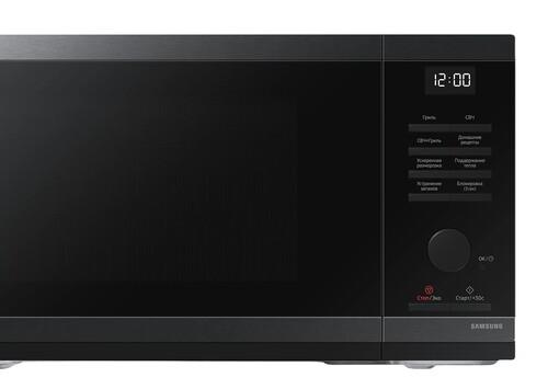 Микроволновая печь Samsung MG23DG4524AGBW черный Микроволновая печь Samsung MG23DG4524AGBW черный — Внешний вид с другого ракурса